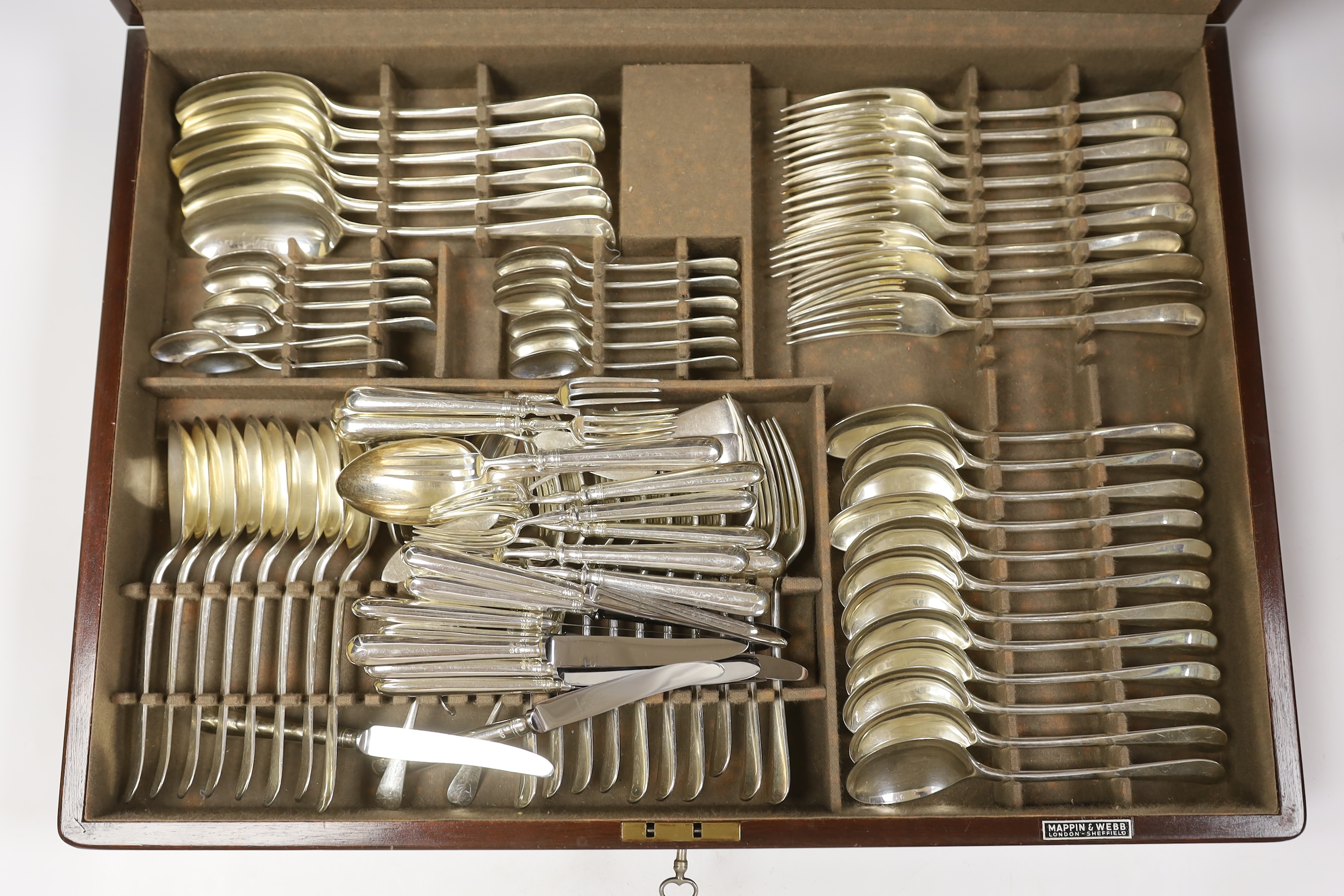 A late 1960's almost complete canteen of silver Hanoverian pattern cutlery by Mappin & Webb, comprising one hundred and nine items, Sheffield, 1964-1968